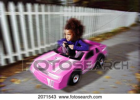 Young Girl In Pink Racing Car View Large Photo Image Stock Image - Young Girl In Pink Racing Car. Fotosearch