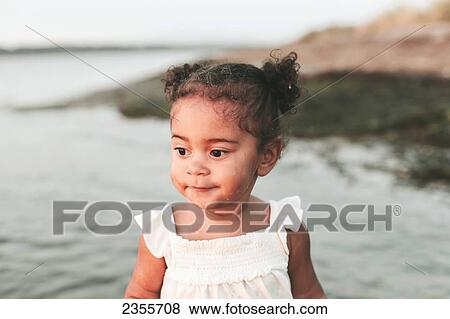 Young Girl On Beach By The Water; British Columbia, Canada View Large Photo Image Stock Photo - Young Girl On Beach By The Water; British Columbia, Canada. Fotosearch