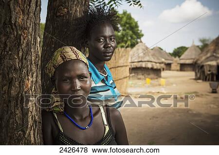 Young girls from the Nuer tribe, close to Gambella, Western Ethiopia; Ethiopia View Large Photo Image Stock Photo - Young girls from the Nuer tribe, close to Gambella, Western Ethiopia; Ethiopia. Fotosearch