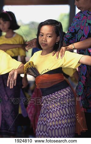 Stock Image - Young Girls Learning Traditional Dance. Fotosearch