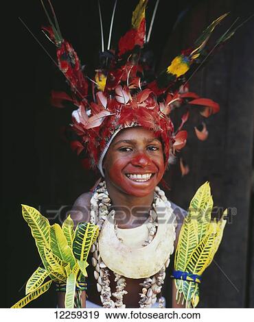 Stock Photo - Young highland girl in traditional dress at the Goroka Show; Goroka, Papua New Guinea. Fotosearch