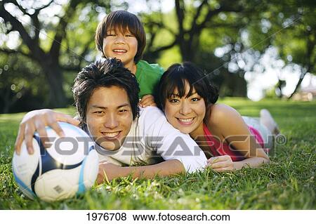 Stock Photo - Young Japanese Couple Playing Together.. Fotosearch