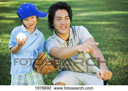Young Japanese Father And Child Playing Baseball. View Large Photo Image Stock Image - Young Japanese Father And Child Playing Baseball.. Fotosearch