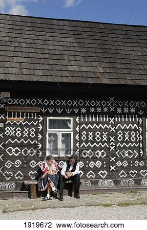 Young Man And Woman Dressed In Traditional Folk Costume Outside Cottage, Cicman, Slovakia View Large Photo Image Stock Image - Young Man And Woman Dressed In Traditional Folk Costume Outside Cottage, Cicman, Slovakia. Fotosearch