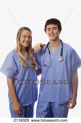 Young medical students in scrubs. View Large Photo Image Stock Photo - Young medical students in scrubs.. Fotosearch