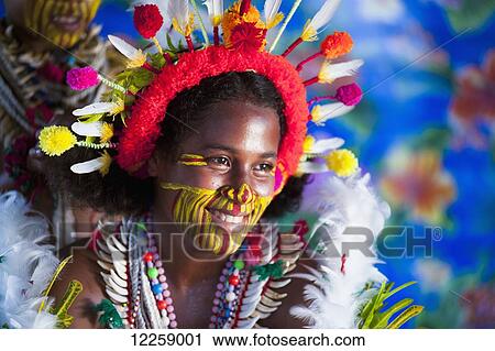 Stock Image - Young Mekeo woman in traditional costume; Central Province, Papua New Guinea. Fotosearch
