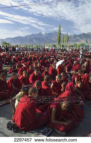 Stock Photo - Young monks and nuns at the Dalai Lama's Teachings. The Dalai Lama visited Leh, Ladakh - a Buddhist enclave in northern India, for four days in August. Fotosearch