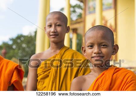 Young monks outside a small temple near Sihanoukville City; Sihanoukville, Cambodia View Large Photo Image Stock Photograph - Young monks outside a small temple near Sihanoukville City; Sihanoukville, Cambodia. Fotosearch