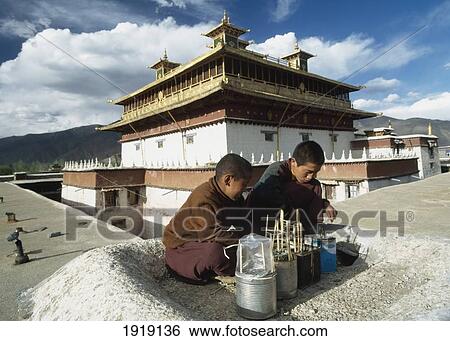 Young Monks Tending Their Plants. View Large Photo Image Stock Photograph - Young Monks Tending Their Plants.. Fotosearch