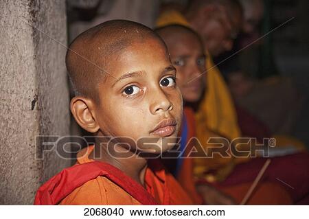 Stock Image - Young Novices, Mahabodi Temple, Bodhgaya, Bihar, India. Fotosearch