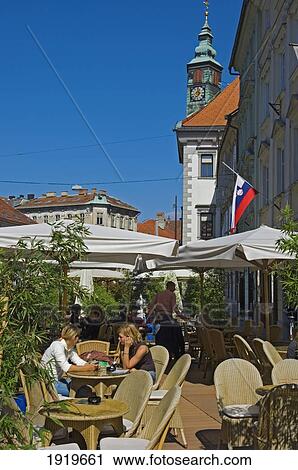 Young People Enjoying The Outdoor Cafe, Ljubljana, Slovenia View Large Photo Image Stock Image - Young People Enjoying The Outdoor Cafe, Ljubljana, Slovenia. Fotosearch