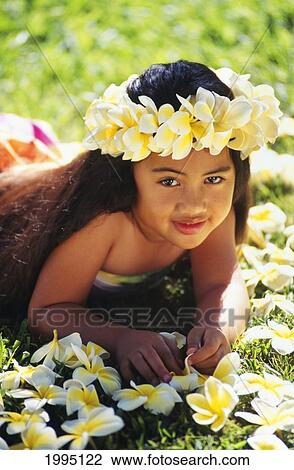 Young Polynesian Girl Laying On Grass With Plumeria Flowers Scattered, Wearing Plumeria Haku View Large Photo Image Stock Image - Young Polynesian Girl Laying On Grass With Plumeria Flowers Scattered, Wearing Plumeria Haku. Fotosearch