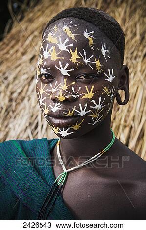 Young Surma (Suri) woman with traditional face decoration, Southwest Ethiopia; Kibish, Ethiopia View Large Photo Image Stock Image - Young Surma (Suri) woman with traditional face decoration, Southwest Ethiopia; Kibish, Ethiopia. Fotosearch
