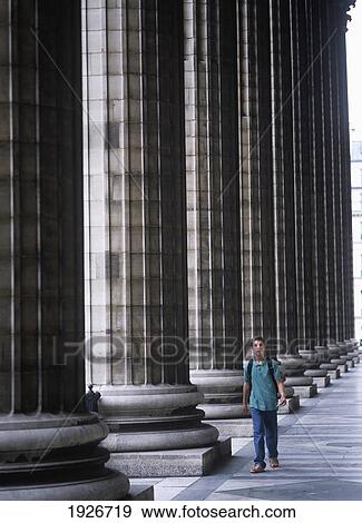Stock Photo - Young Tourist Beside Madelaine Church. Fotosearch