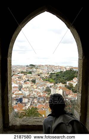 Young Woman Enjoying The Views Of The City From The Castle Of St Jorge, Lisbon, Portugal, March'08 View Large Photo Image Stock Image - Young Woman Enjoying The Views Of The City From The Castle Of St Jorge, Lisbon, Portugal, March'08. Fotosearch