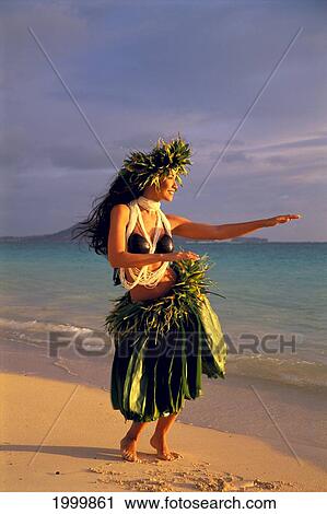 Young Woman Hula On Beach At Sunrise With Coconut Top, Haku Ti Leaf Skirt, Shell Lei View Large Photo Image Stock Image - Young Woman Hula On Beach At Sunrise With Coconut Top, Haku Ti Leaf Skirt, Shell Lei. Fotosearch