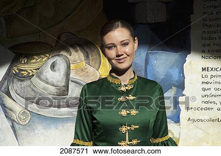 Stock Image - Young Woman In A Traditional Dress In, Legislative Palace Of Aguascalientes, Mexico. Fotosearch