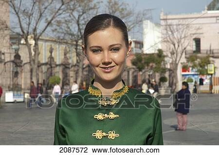 Stock Image - Young Woman In A Traditional Dress In Aguascalientes, Mexico. Fotosearch