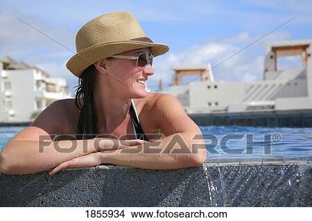 Picture - Young Woman In Pool, Cabo San Lucas, Mexico. Fotosearch