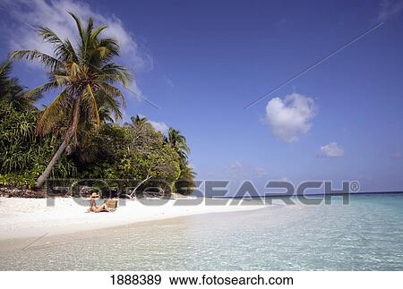 Young Woman On Deserted Island. View Large Photo Image Stock Photo - Young Woman On Deserted Island.. Fotosearch