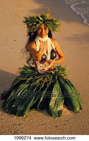 Young Woman On Knees, Hula Along Shoreline With Ti Leaf Skirt, Haku, Coconut Top View Large Photo Image Picture - Young Woman On Knees, Hula Along Shoreline With Ti Leaf Skirt, Haku, Coconut Top. Fotosearch