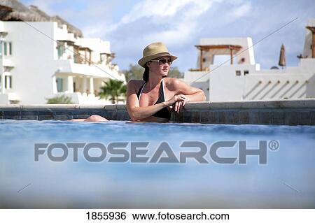 Young Woman Poolside, Cabo San Lucas, Mexico View Large Photo Image Stock Photograph - Young Woman Poolside, Cabo San Lucas, Mexico. Fotosearch