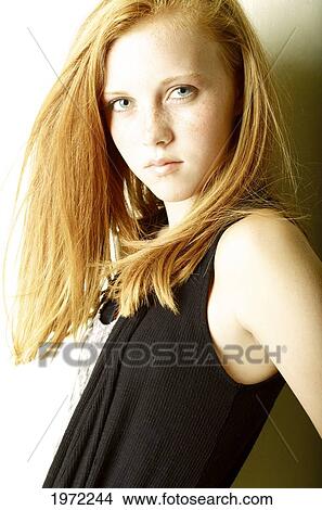Picture - Young Woman With Freckles And Red Hair Poses For Camera.. Fotosearch
