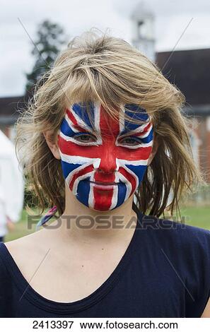 Stock Photo - Young woman with Union Jack painted on her face at the health festival; Reading, Berkshire, England. Fotosearch