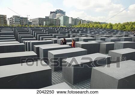 Stock Image - Young Women At The Memorial To The Murdered Jews Of Europe, Berlin, Germany. Fotosearch