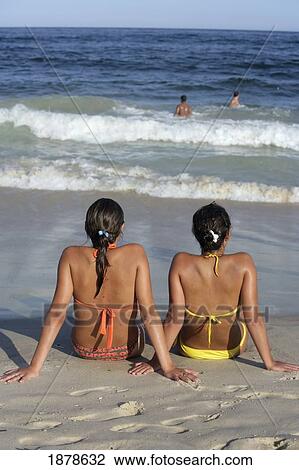 Young Women Sunbathing. View Large Photo Image Stock Image - Young Women Sunbathing.. Fotosearch