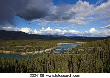 Yukon River running through the valley near Whitehorse; Yukon, Canada View Large Photo Image Stock Photography - Yukon River running through the valley near Whitehorse; Yukon, Canada. Fotosearch