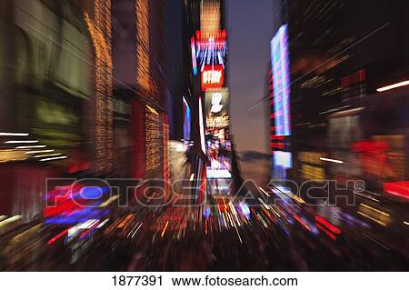 Stock Image - Zoomed Effect Of The Lights At Times Square; Manhattan, New York City, New York, Usa. Fotosearch