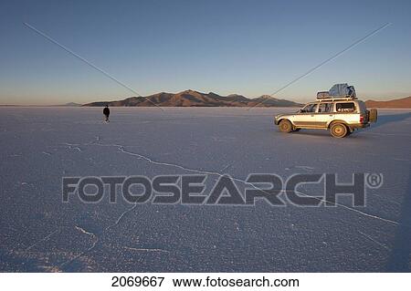 4X4 Vehicle In The Salar De Uyuni, The World's Largest Salt Flat, Potosi Department, Bolivia View Large Photo Image Stock Photo - 4X4 Vehicle In The Salar De Uyuni, The World's Largest Salt Flat, Potosi Department, Bolivia. Fotosearch