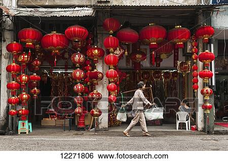 A Chinese lantern shop, a woman 