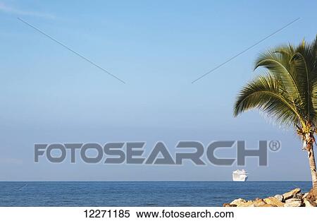 A cruise ship makes its way to port along the Mexican Riviera; Puerto Vallarta, Mexico View Large Photo Image Stock Photography - A cruise ship makes its way to port along the Mexican Riviera; Puerto Vallarta, Mexico. Fotosearch