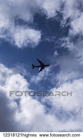 Stock Photograph - A plane departing from London; London, England. Fotosearch