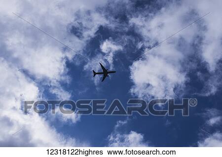 Stock Photograph - A plane departing from London; London, England. Fotosearch