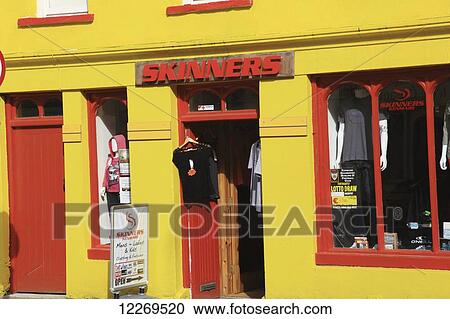 A retail shop in a bright colourful building View Large Photo Image Stock Image - A retail shop in a bright colourful building. Fotosearch