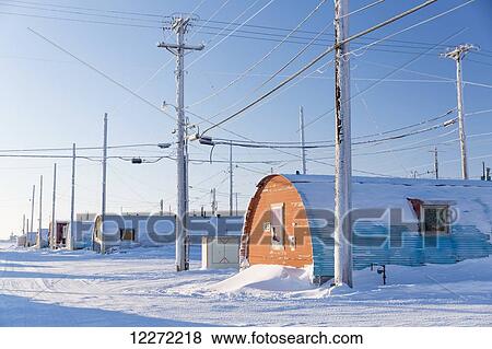 A row of powerlines stand beside Barrow Naval Base Quonset huts, Barrow, Arctic Alaska, Winter View Large Photo Image Stock Photo - A row of powerlines stand beside Barrow Naval Base Quonset huts, Barrow, Arctic Alaska, Winter. Fotosearch