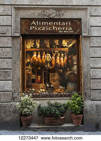 Stock Photo - A salumeria, or deli, for fine Italian meats; Siena, Italy. Fotosearch