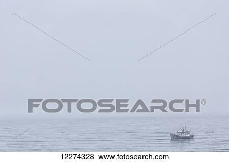 A small fishing boat floats through the mist; Haida Gwaii, British Columbia, Canada View Large Photo Image Stock Photo - A small fishing boat floats through the mist; Haida Gwaii, British Columbia, Canada. Fotosearch