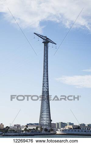 A tower with cables along the waterfront, near Cadiz; Andalusia, Spain View Large Photo Image Stock Photograph - A tower with cables along the waterfront, near Cadiz; Andalusia, Spain. Fotosearch