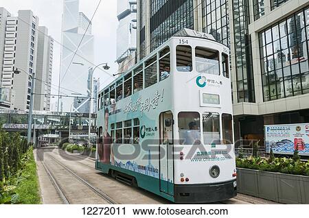 A tram with some skyscrapers as background; Hong Kong, China View Large Photo Image Stock Image - A tram with some skyscrapers as background; Hong Kong, China. Fotosearch