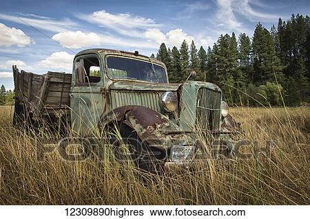 Stock Photograph - A vintage truck abandoned in a field; Palouse, Washington, United States of America. Fotosearch