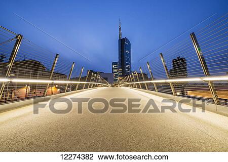 Stock Image - A walkway and Unicredit tower in the finance district; Milan, Lombardy, Italy. Fotosearch