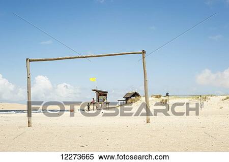 A wooden goal post on the beach with a lifeguard on duty in the background; Valizas, Uruguay View Large Photo Image Stock Photography - A wooden goal post on the beach with a lifeguard on duty in the background; Valizas, Uruguay. Fotosearch