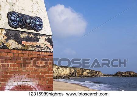 Stock Photograph - Abandoned brick shelter on a beach; South Shields, Tyne and Wear, England. Fotosearch