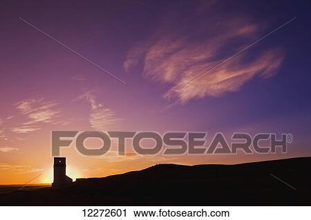 Stock Image - Abandoned grain elevator; Thunder Creek, Saskatchewan, Canada. Fotosearch