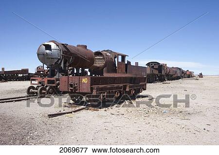 Abandoned Steam Engines In The Train Graveyard Of Uyuni, Potosi Department, Bolivia View Large Photo Image Stock Photo - Abandoned Steam Engines In The Train Graveyard Of Uyuni, Potosi Department, Bolivia. Fotosearch