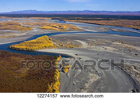 Stock Photo - Aerial of the Noatak River, Igichuk Hills and the Baird Mountains in the distance, Noatak, Arctic Alaska, USA, Fall. Fotosearch